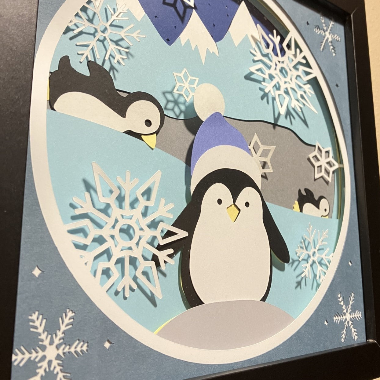 Playing Penguins, Shadowbox, angle view