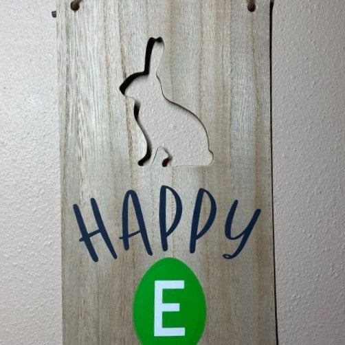 Closeup of cutout Happy Easter Eggs Sign