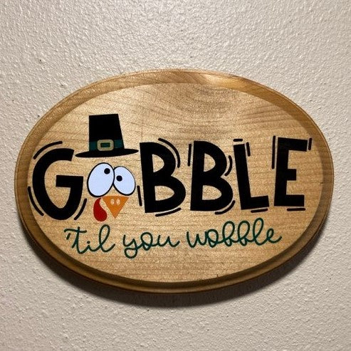 Gobble 'til you wobble, wood sign