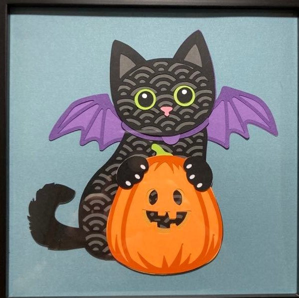 Black cat with pumpkin, layered art, close up