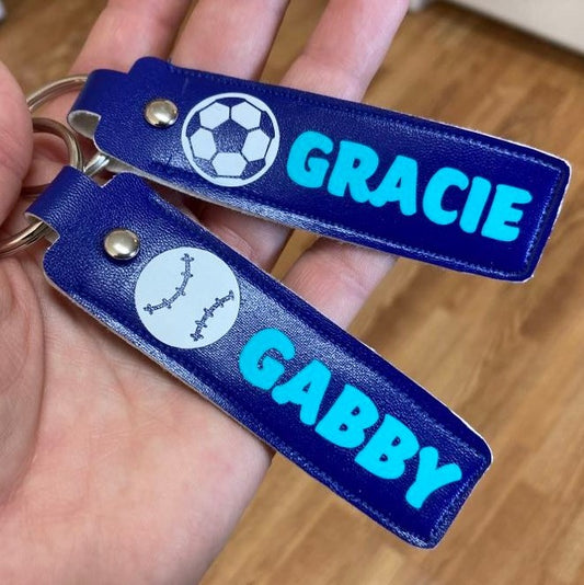 Personalized key fob/bag tag, blue with teal and ball added